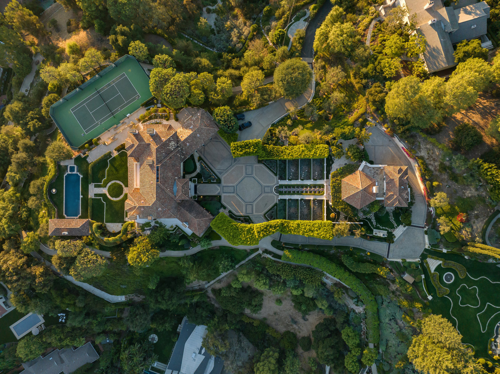 Overhead composition of the motor court, residences, and tennis court