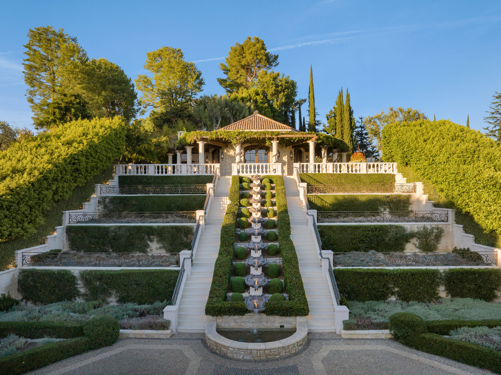 Formal garden stair and fountain approach