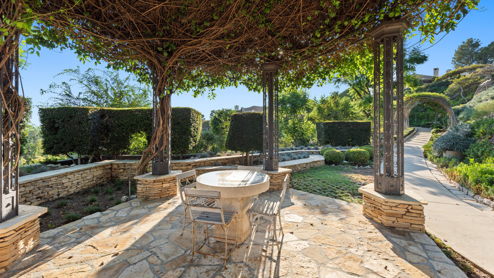Vine-covered garden loggia