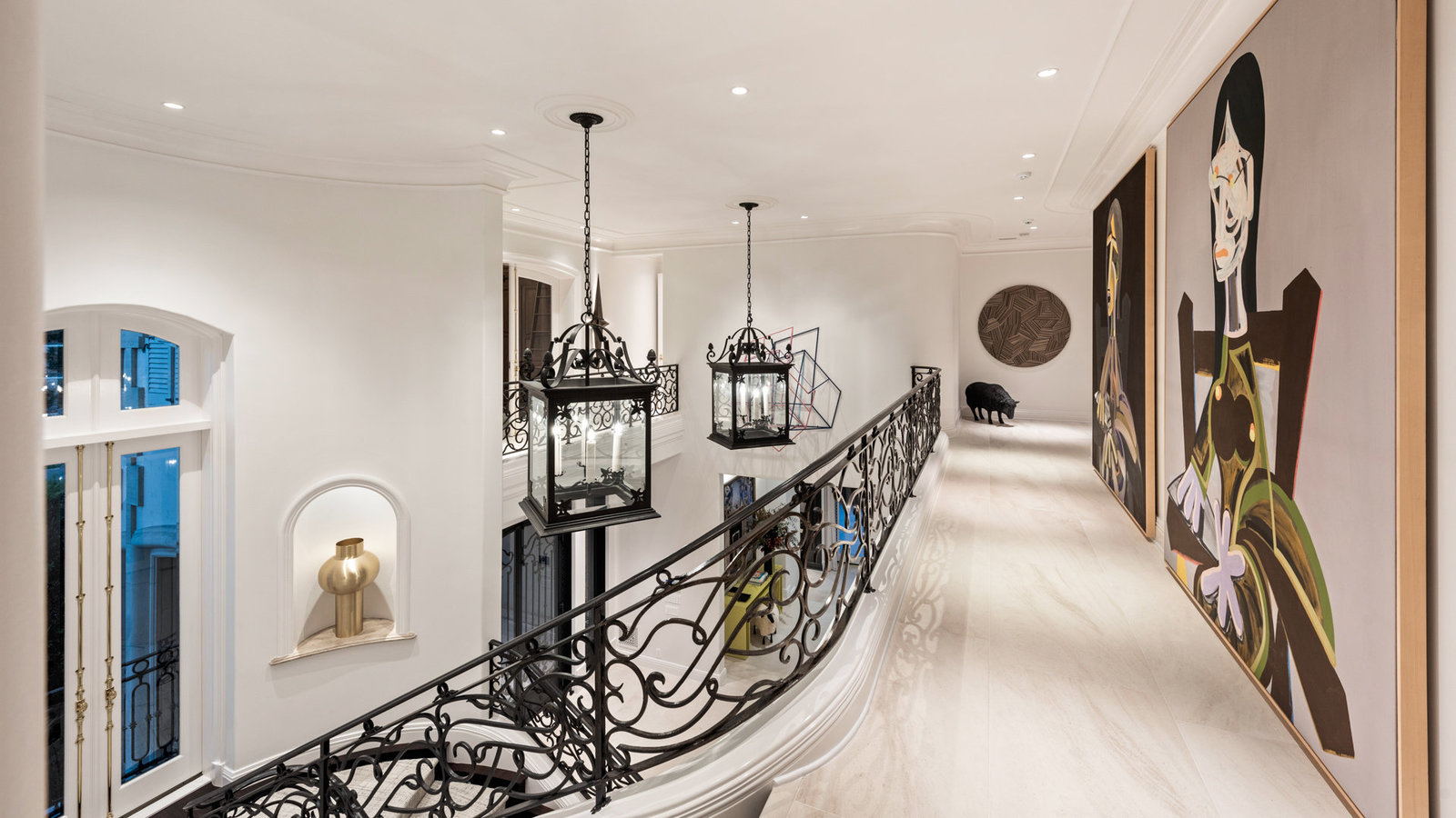 Upper gallery with curated artwork